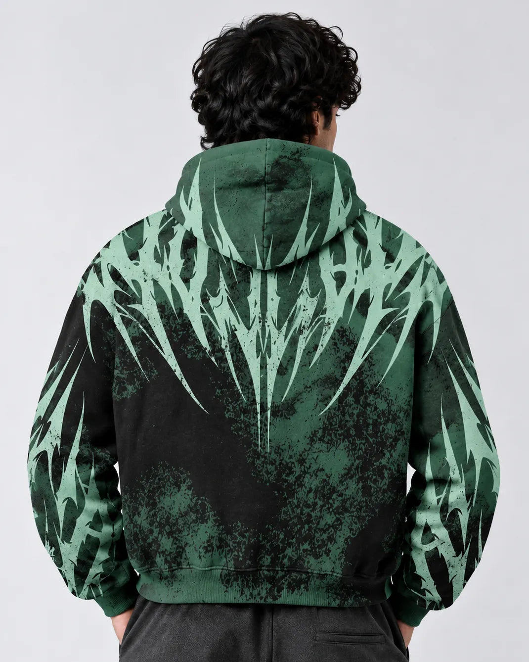 Green and black graphic hoodie for men with an abstract print