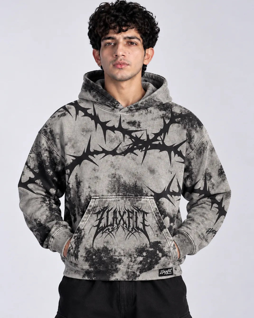 Grey and black graphic hoodie for men with an edgy abstract design