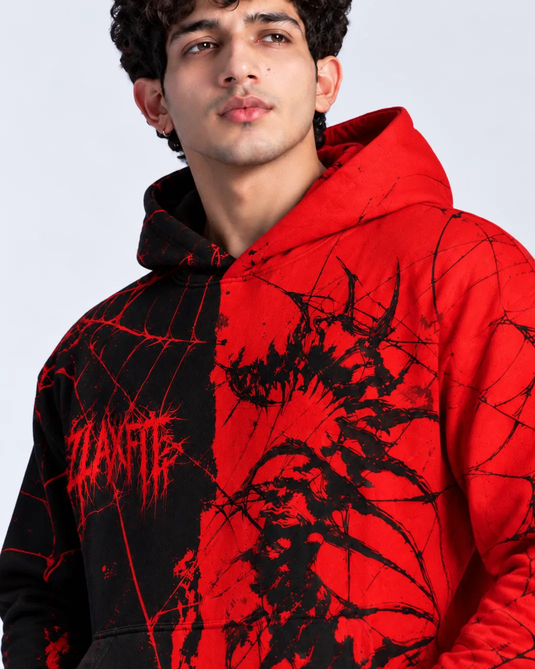 Men's streetwear hoodie with a striking red and black spider-inspired design Copy ALT text