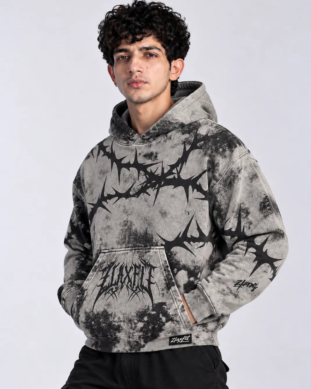 Men's hoodie featuring a grey washed effect and dark graphic artwork