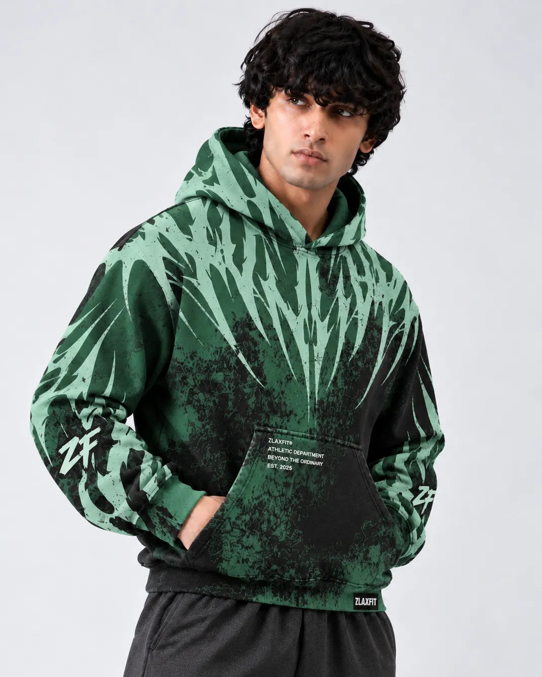 Zlaxfit Toxic Reign Hoodie in green and black with bold abstract graphic print
